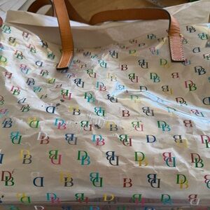 Dooney & Bourke Multicolor DB Logo Clear Tote with Tan Leather Handles